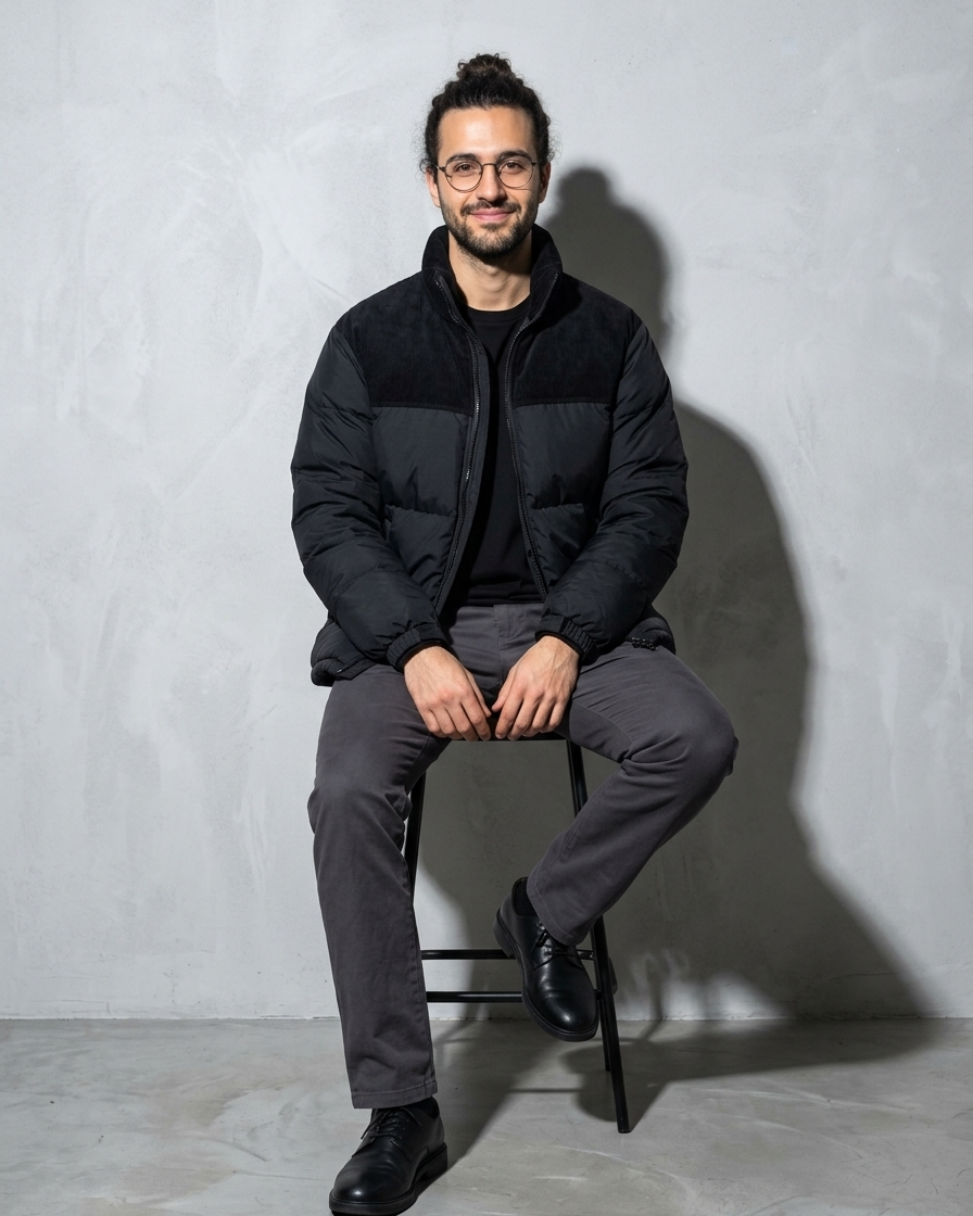 Duck Down Down Jacket Men's Winter American Outdoor, stool, legs crossed, worn by model