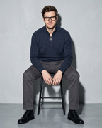 Zipper High Neck Thickened Woolen Sweater, perched on stool edge, worn by model