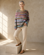 Women's Fashionable Pullover Sweater Top in Rainbow, step onto plinth, worn by model