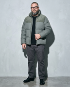 Duck Down Down Jacket Men's Winter American Outdoor, half turn, hand at hem, worn by model