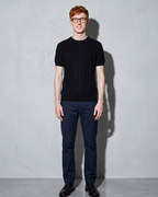 Men's Lightweight Solid Crewneck T-Shirt, sleeves pushed, arms down, worn by model