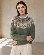 Women's Fashionable Pullover Sweater Top in Light Green, crossed forearms, cuff and hem, worn by model