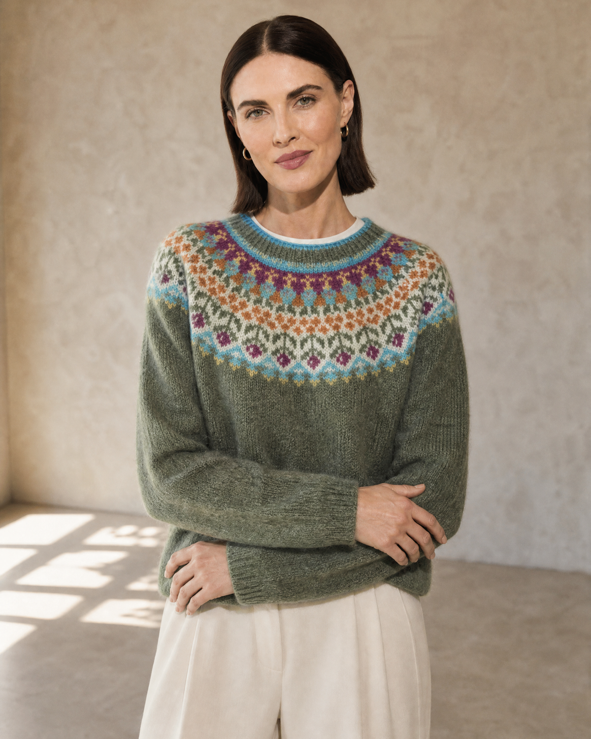 Women's Fashionable Pullover Sweater Top in Light Green, crossed forearms, cuff and hem, worn by model