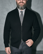 Men's Retro Zip-Front Knit Cardigan, bust-to-thigh, one hand at hem, worn by model