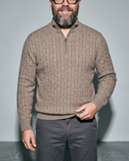 Men's Stand-Collar Cable-Knit Zip Sweater, bust-to-thigh, one hand at hem, worn by model