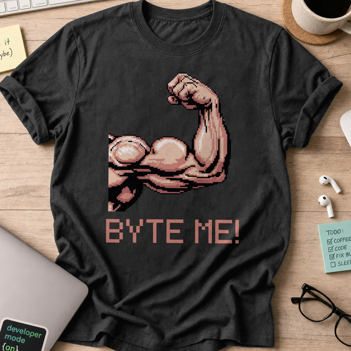 Black programmer shirt printed with "byte me macho", a funny developer t-shirt and coding gift for software engineers and coders.