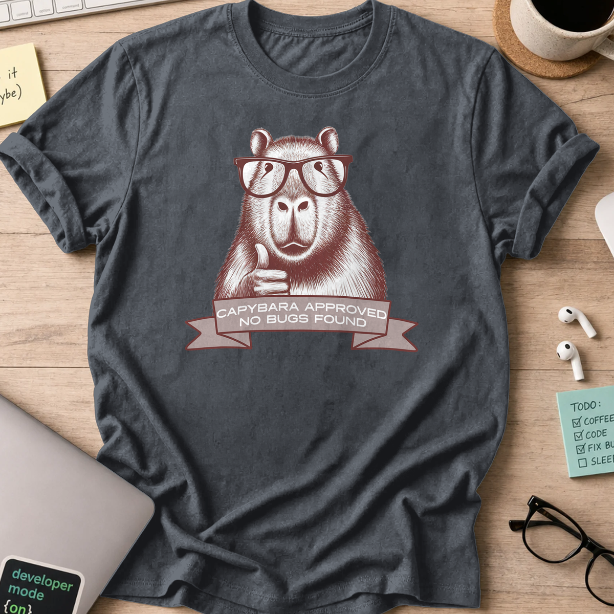 Dark Heather Grey programmer shirt printed with "Capybara approved", a funny developer t-shirt and coding gift for software engineers and coders.