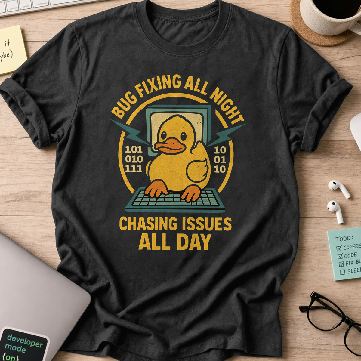 Black programmer shirt printed with "chasing issues all day", a funny developer t-shirt and coding gift for software engineers and coders.