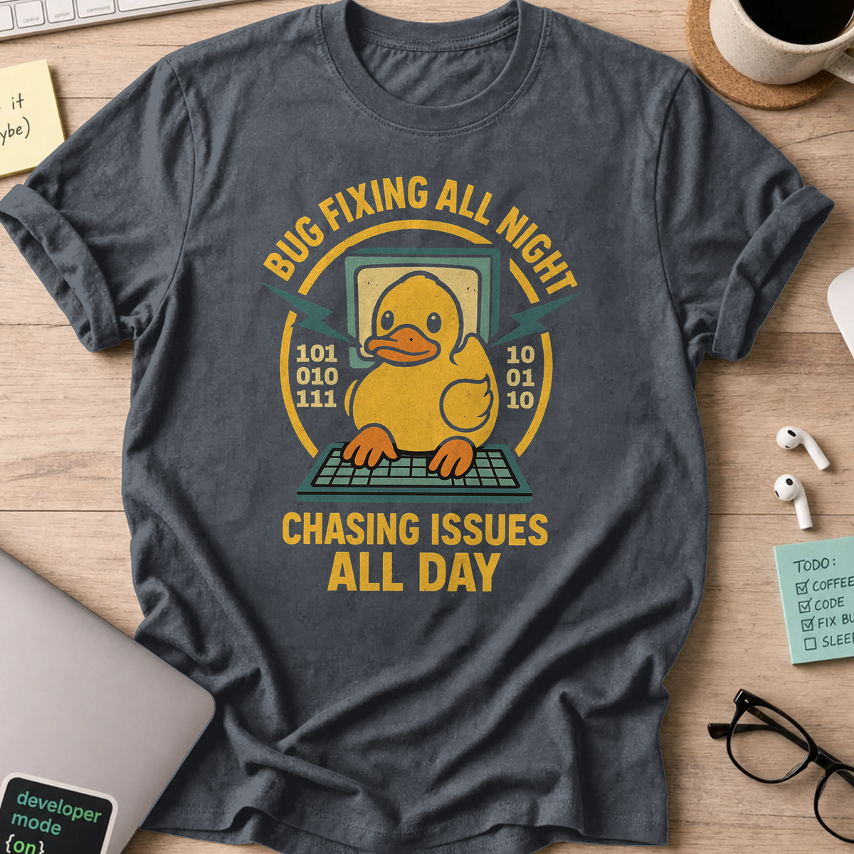 Dark Heather Grey programmer shirt printed with "chasing issues all day", a funny developer t-shirt and coding gift for software engineers and coders.