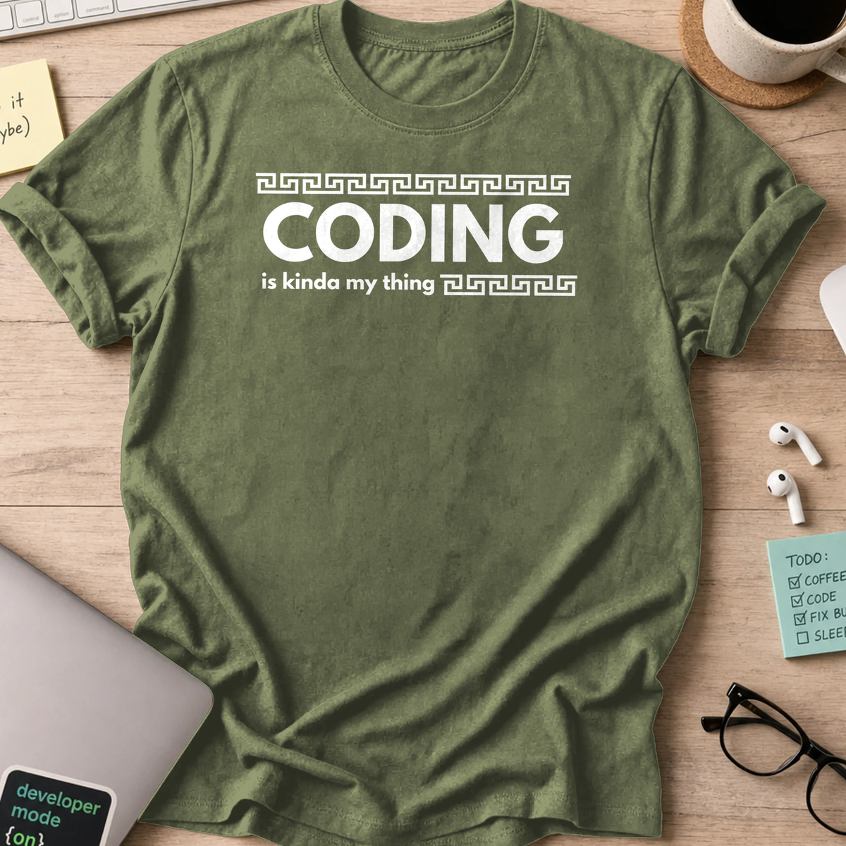 Military Green programmer shirt printed with "coding is kinda my thing", a funny developer t-shirt and coding gift for software engineers and coders.