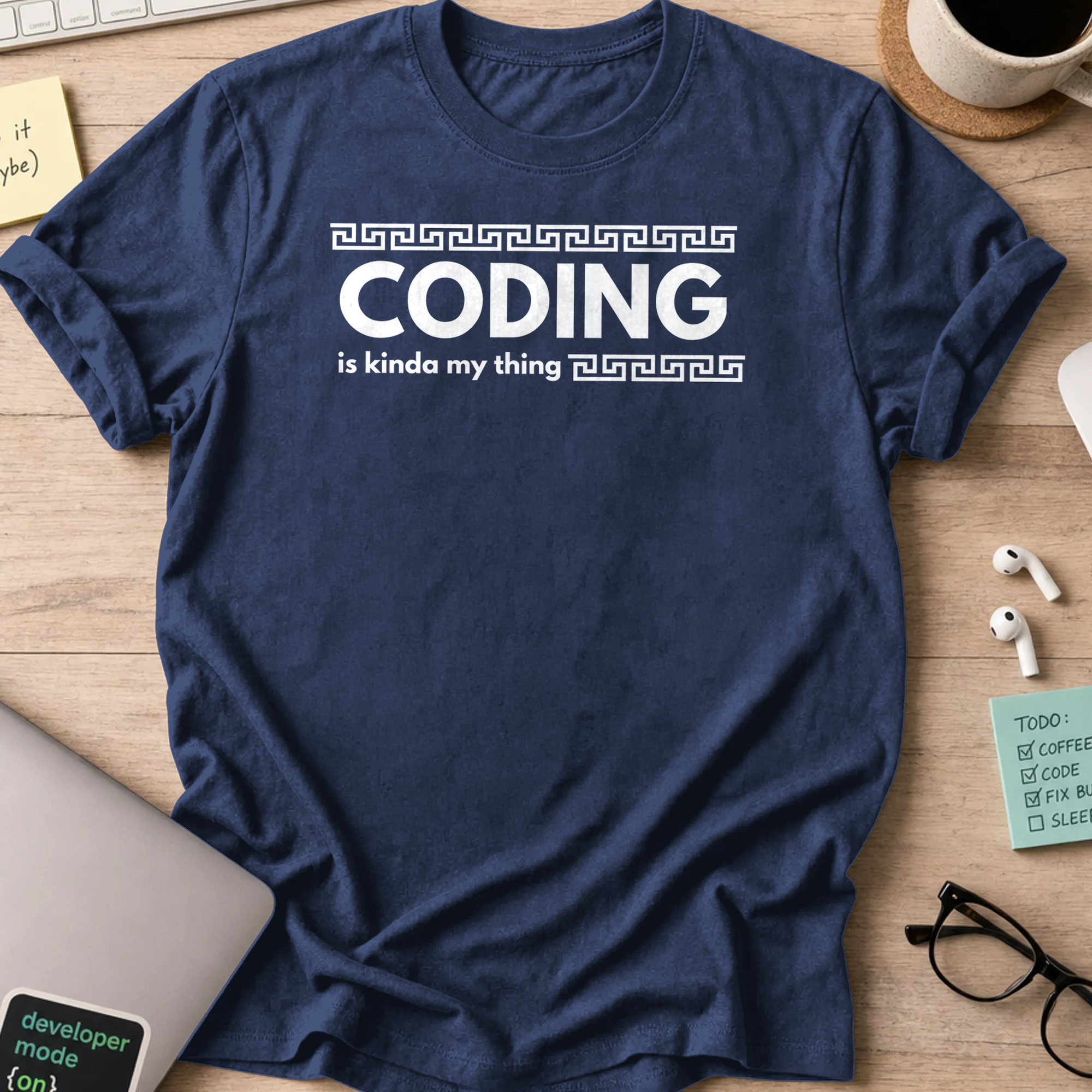 Navy programmer shirt printed with "coding is kinda my thing", a funny developer t-shirt and coding gift for software engineers and coders.