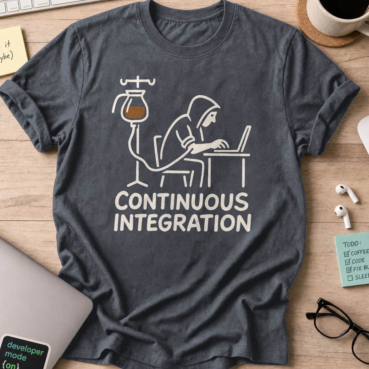 Dark Heather Grey devops shirt printed with "continuous integration", a funny programmer t-shirt and gift for DevOps and SRE engineers.