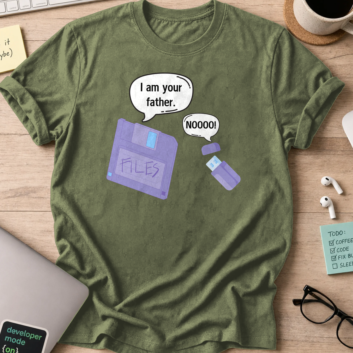 Military Green programmer shirt printed with "daddy diskette and baby usb", a funny developer t-shirt and gift for the programmer dad in your life.