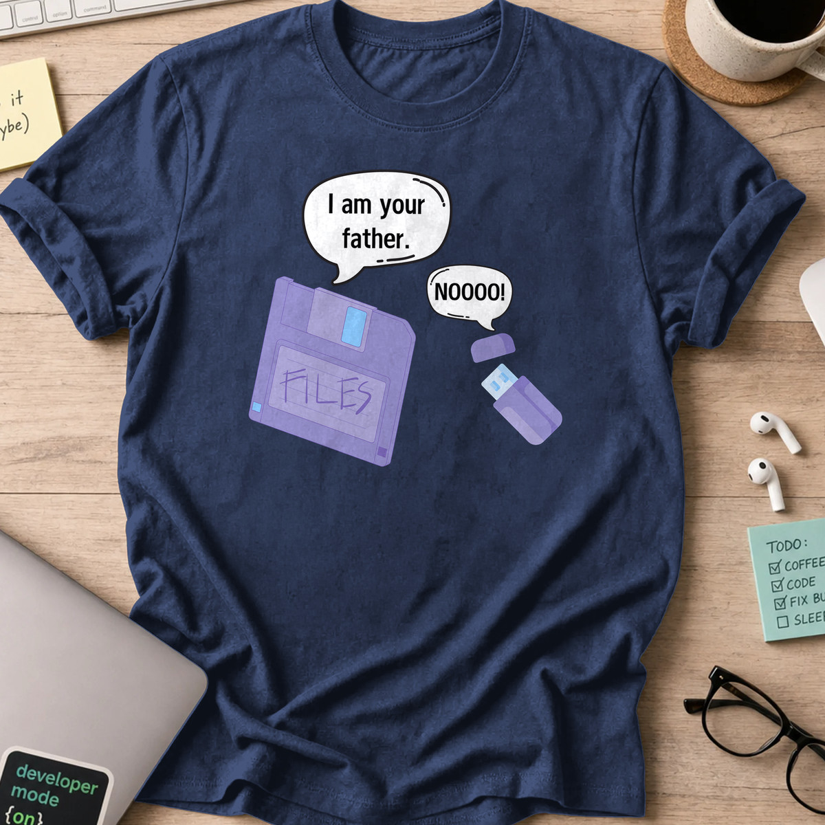 Navy programmer shirt printed with "daddy diskette and baby usb", a funny developer t-shirt and gift for the programmer dad in your life.