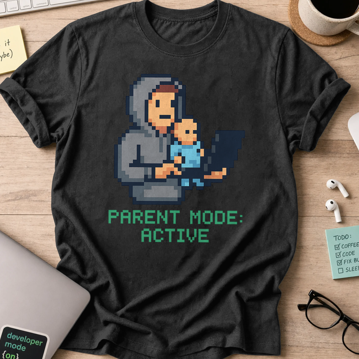 Black programmer shirt printed with "DAD parent mode active", a funny developer t-shirt and gift for the programmer dad in your life.