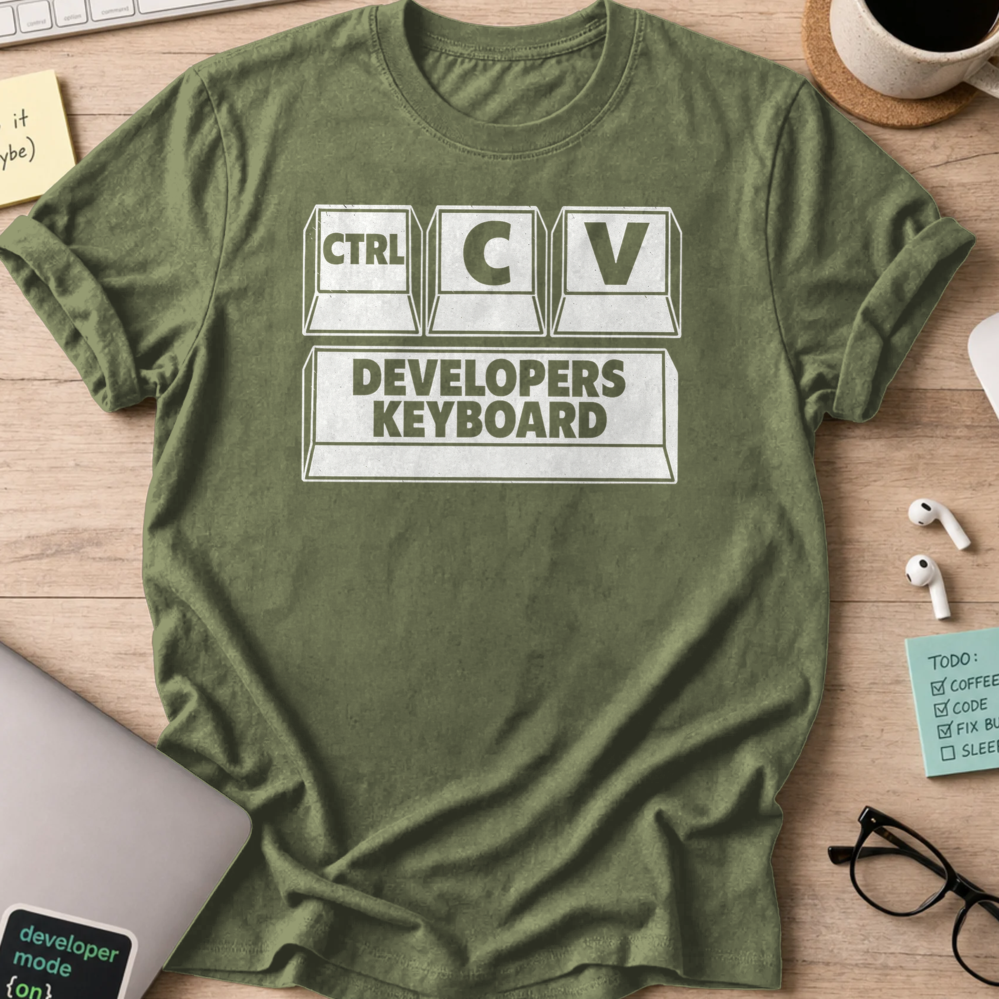 Military Green programmer shirt printed with "developers keyboard", a funny developer t-shirt and coding gift for software engineers and coders.