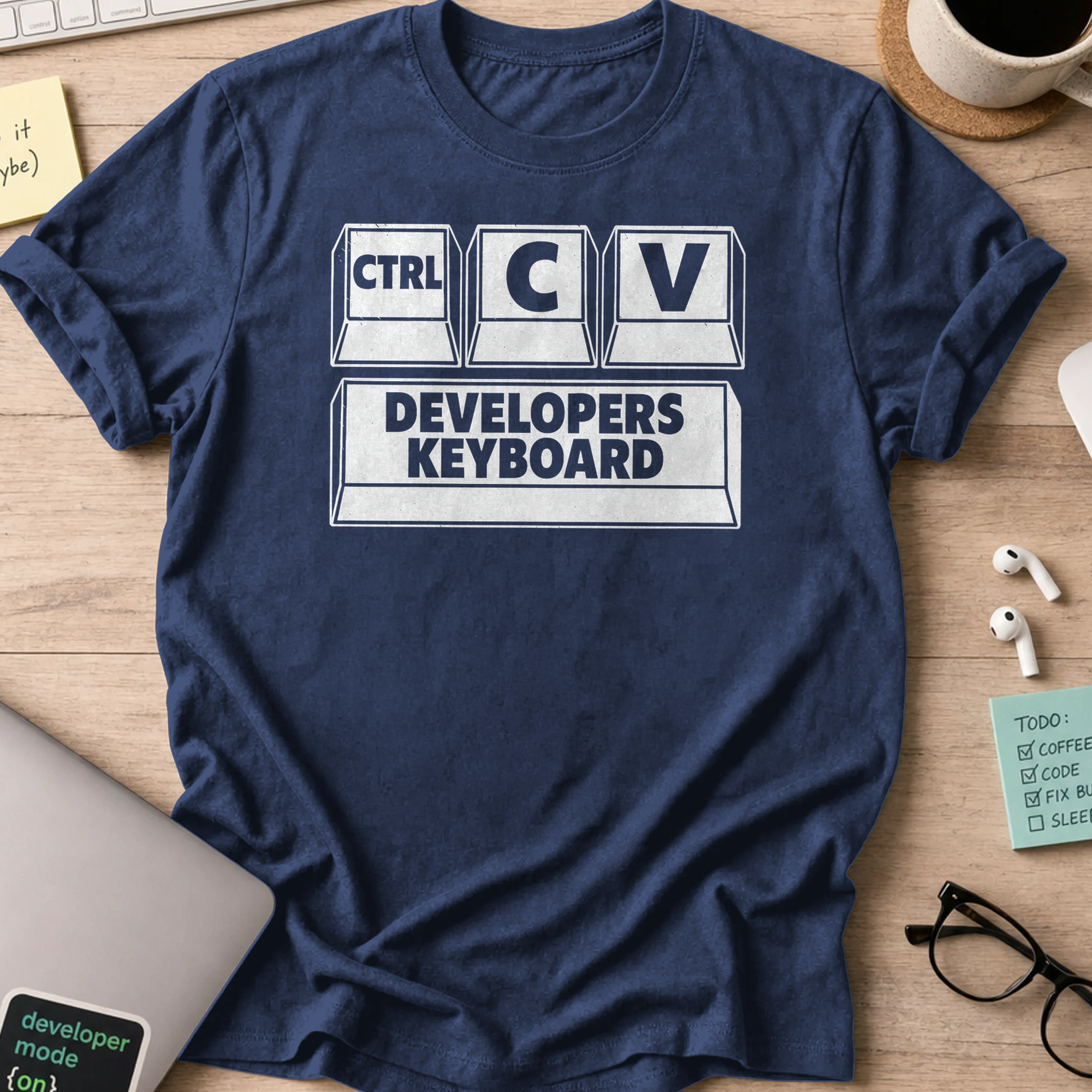 Navy programmer shirt printed with "developers keyboard", a funny developer t-shirt and coding gift for software engineers and coders.