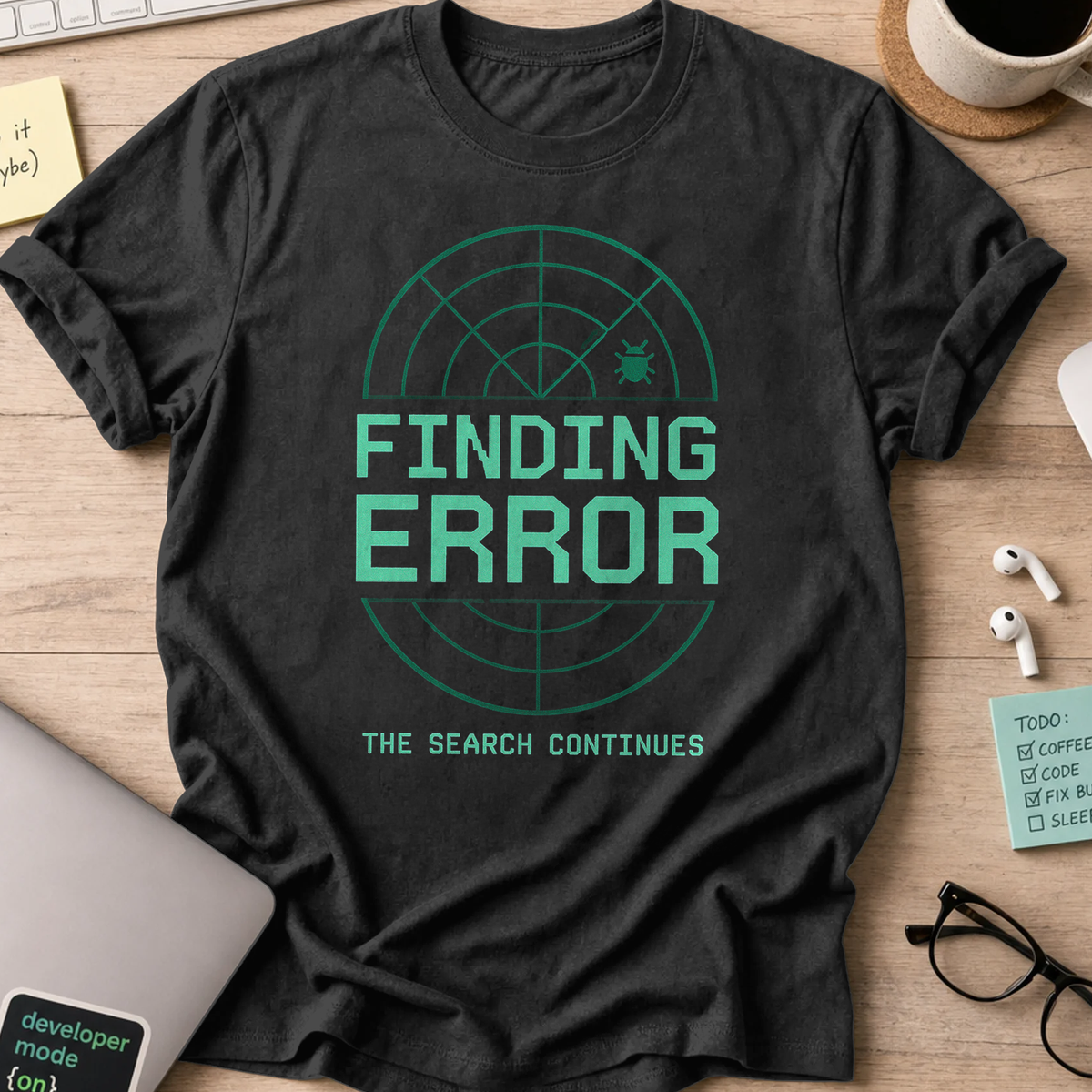Black programmer shirt printed with "Finding Error Bug", a funny developer t-shirt and coding gift for software engineers and coders.