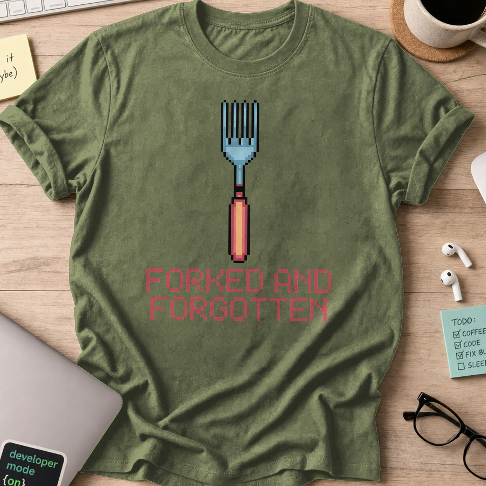 Military Green programmer shirt printed with "forked and forgotten", a funny developer t-shirt and coding gift for software engineers and coders.