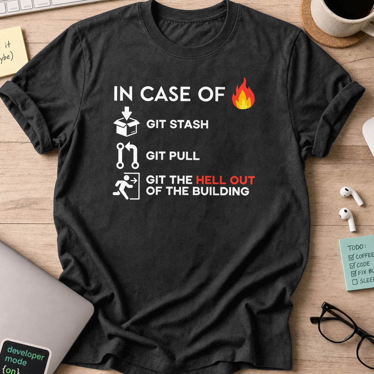 Black programmer shirt printed with "GIT the hell out", a funny developer t-shirt and coding gift for software engineers and coders.