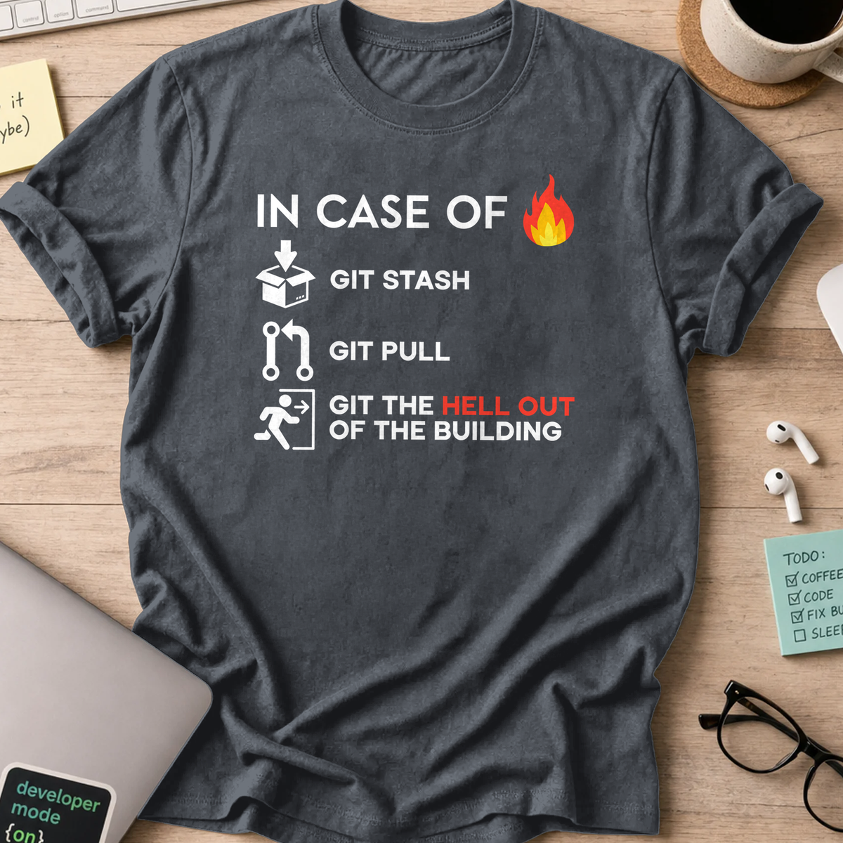 Dark Heather Grey programmer shirt printed with "GIT the hell out", a funny developer t-shirt and coding gift for software engineers and coders.
