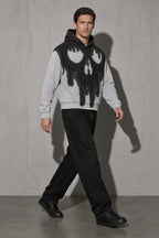 Dripping skull men's black hoodie, full-body view
