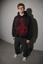 Men's black red skeleton graphic hoodie standing view