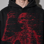 Red skeleton hoodie graphic detail on black fleece