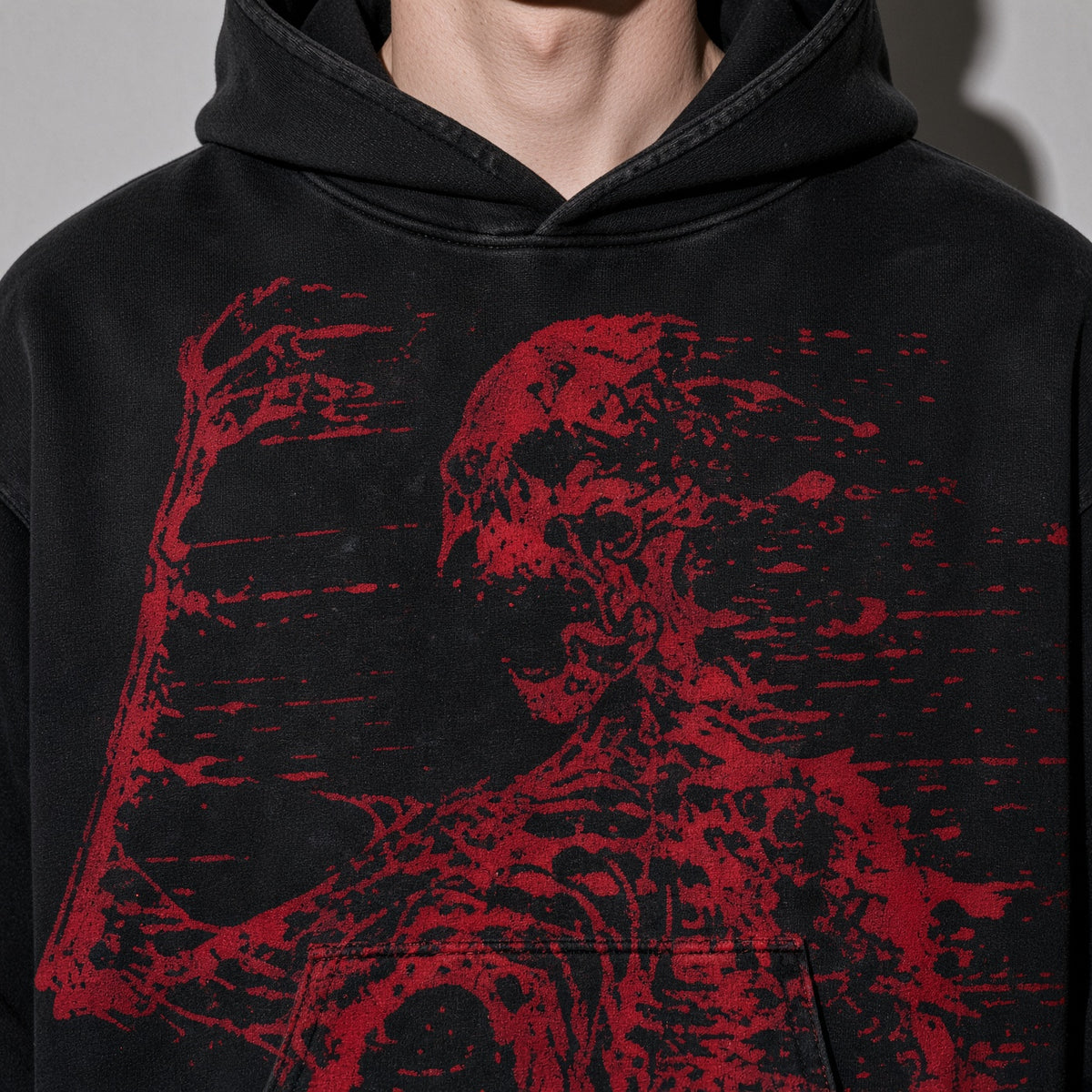 Red skeleton hoodie graphic detail on black fleece