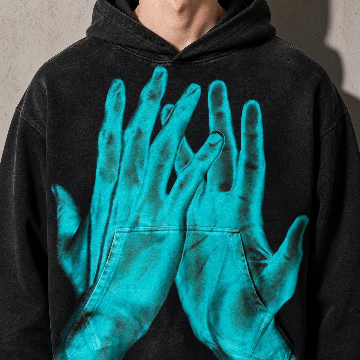 Turquoise ghost hands men's black hoodie, macro design view