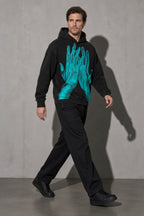 Turquoise ghost hands men's black hoodie, full-body view