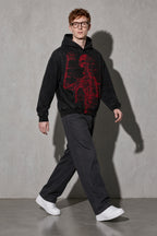 Men's black red skeleton graphic hoodie walking view