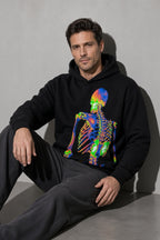 Men's black neon skeleton graphic hoodie seated view