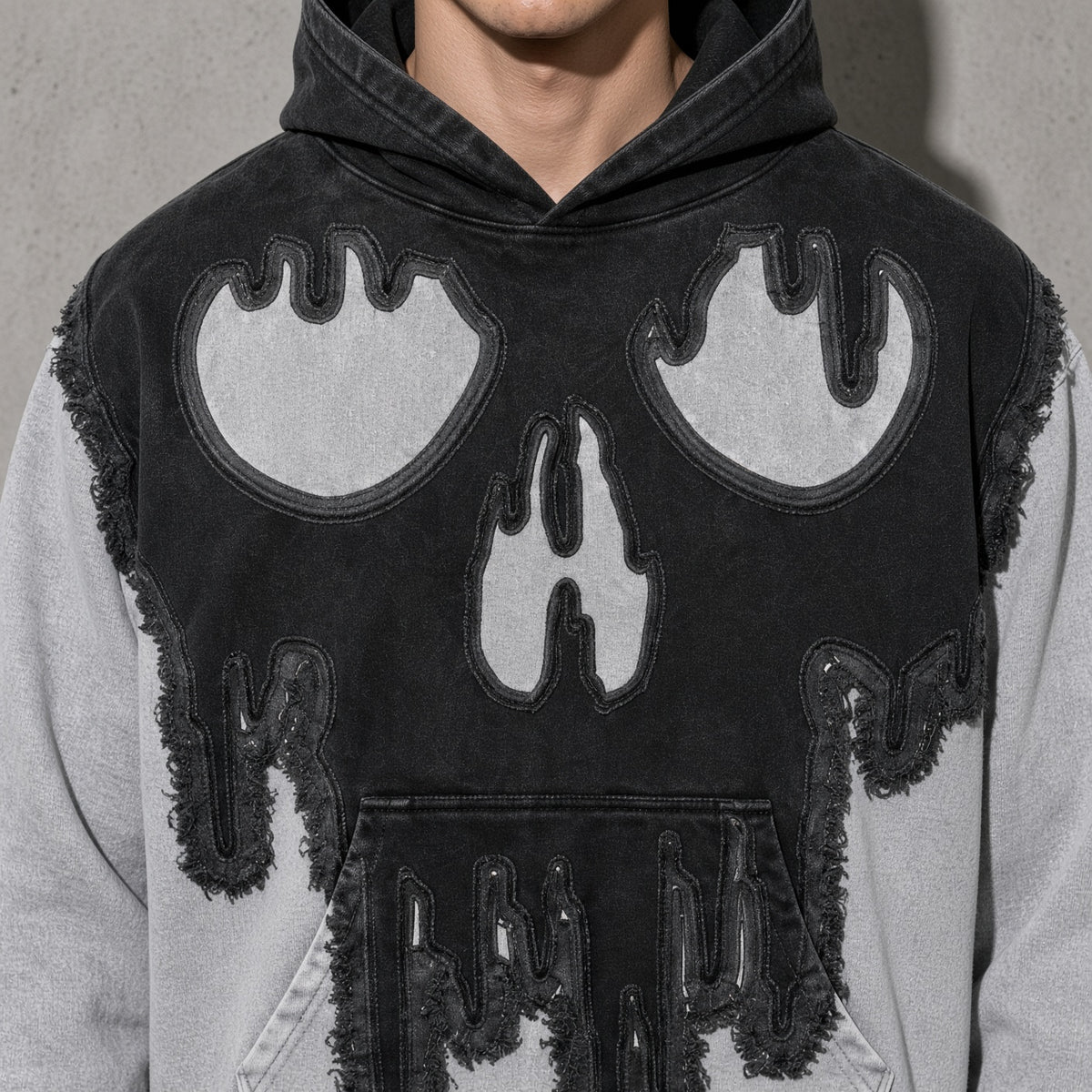 Dripping skull men's black hoodie, macro design view