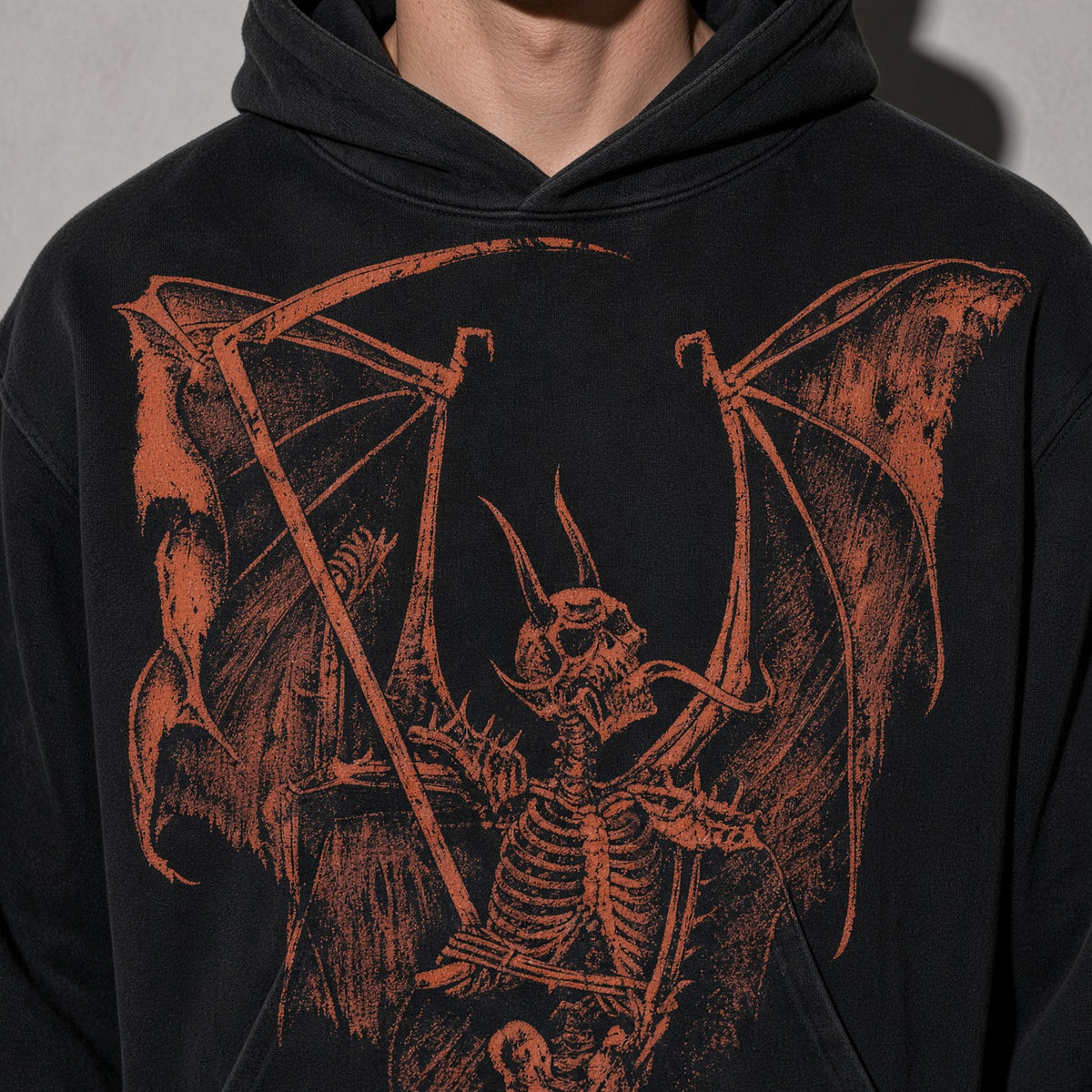Winged skeleton hoodie graphic detail on black fleece