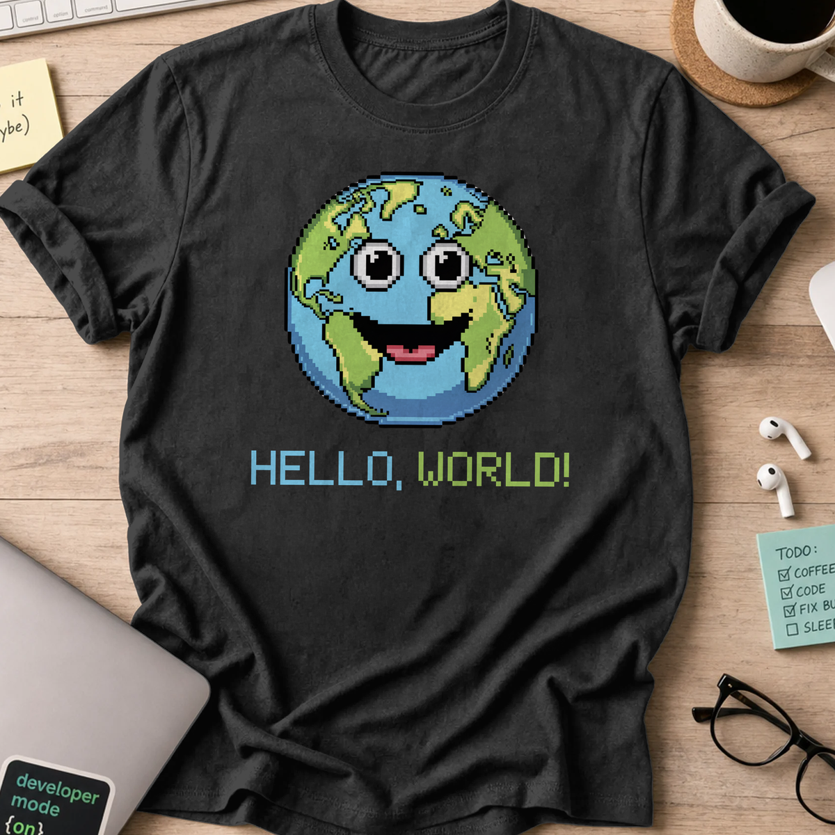 Black programmer shirt printed with "hello world earth", a funny developer t-shirt and coding gift for software engineers and coders.