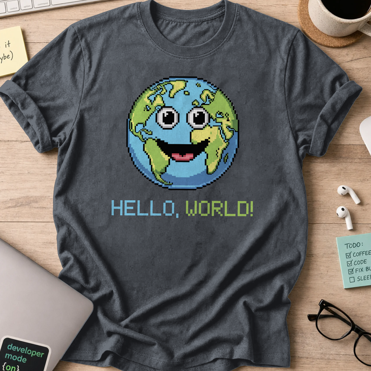 Dark Heather Grey programmer shirt printed with "hello world earth", a funny developer t-shirt and coding gift for software engineers and coders.