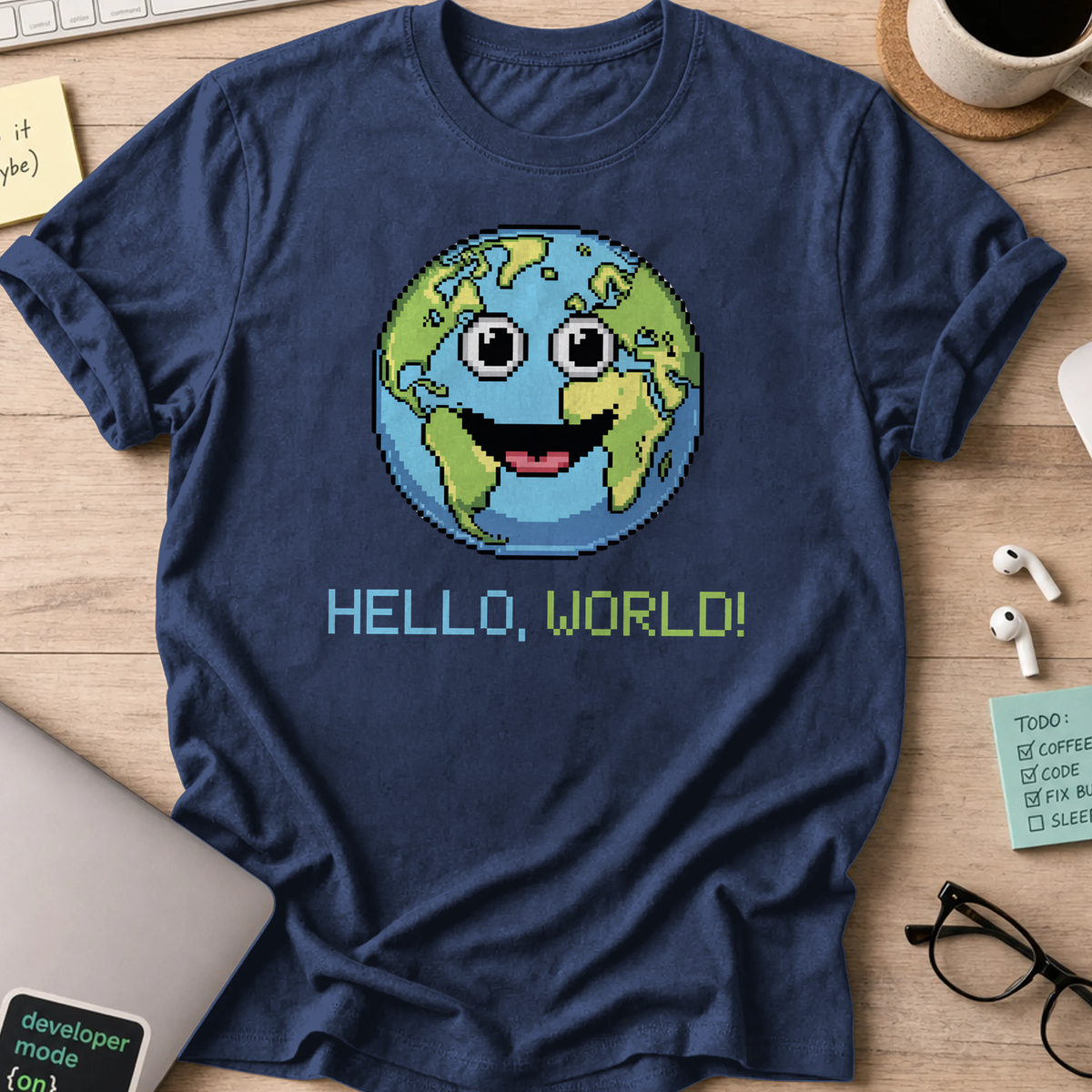 Navy programmer shirt printed with "hello world earth", a funny developer t-shirt and coding gift for software engineers and coders.