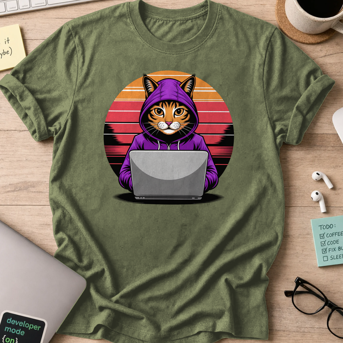 Military Green programmer shirt printed with "Hooded cat retro" and a cat graphic, a funny developer t-shirt and coding gift for software engineers.