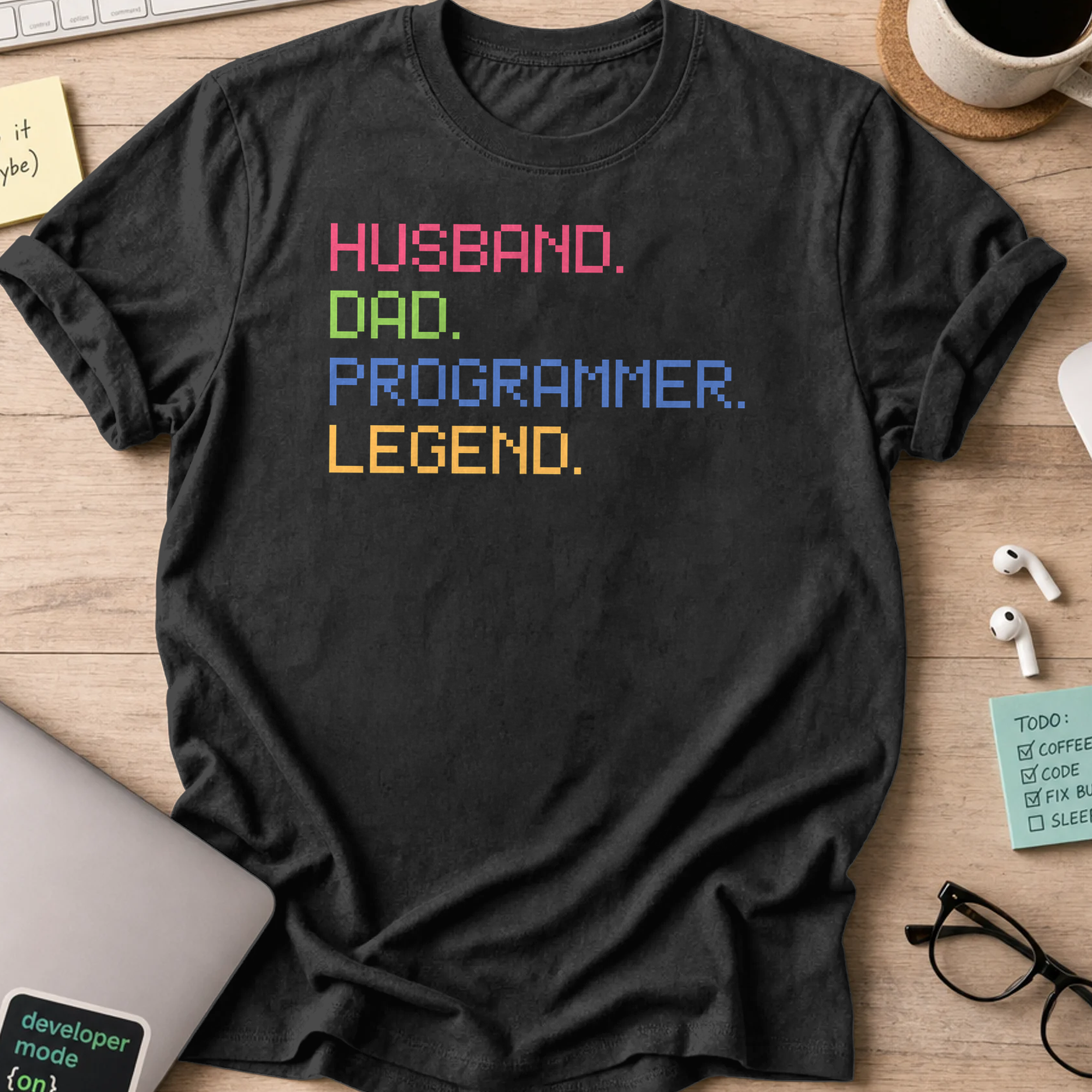 Black programmer shirt printed with "husband dad programmer legend", a funny developer t-shirt and gift for the programmer dad in your life.