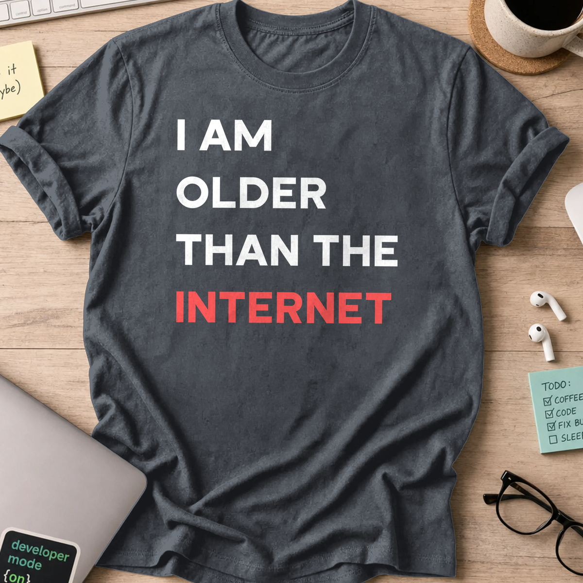 Dark Heather Grey programmer shirt printed with "I am older than the internet", a funny developer t-shirt and coding gift for software engineers.