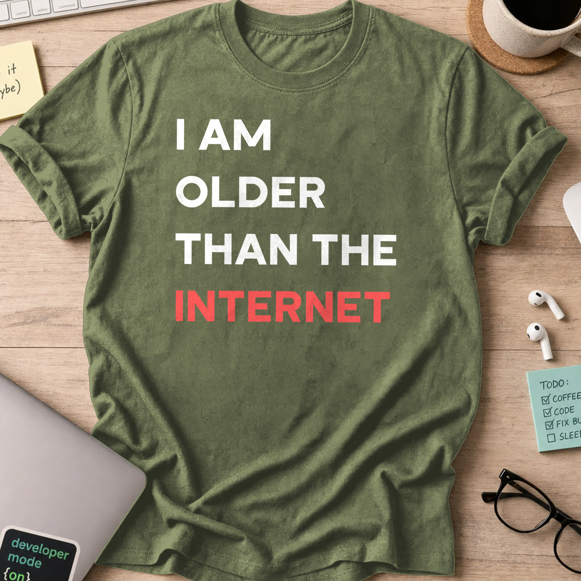Military Green programmer shirt printed with "I am older than the internet", a funny developer t-shirt and coding gift for software engineers.