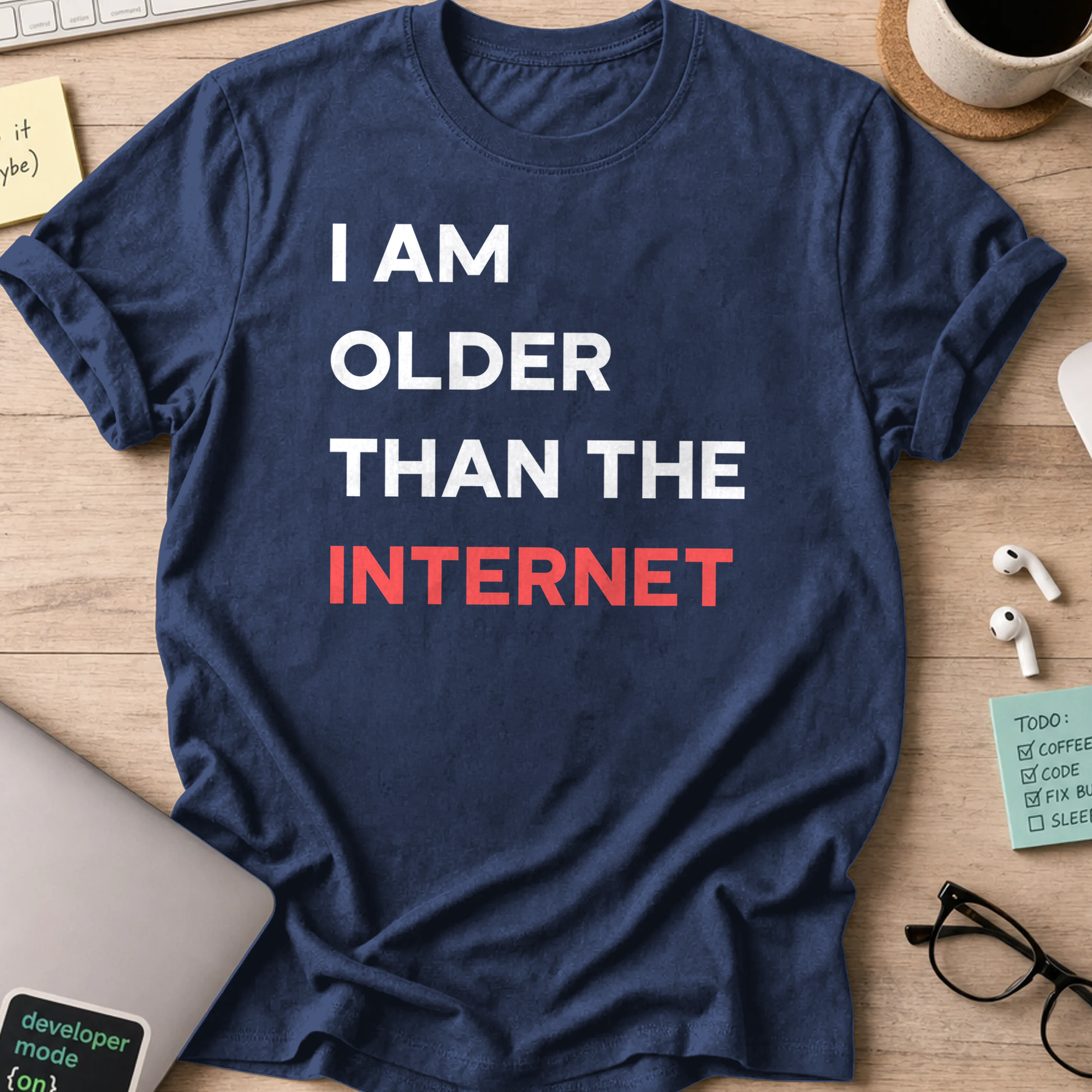 Navy programmer shirt printed with "I am older than the internet", a funny developer t-shirt and coding gift for software engineers and coders.