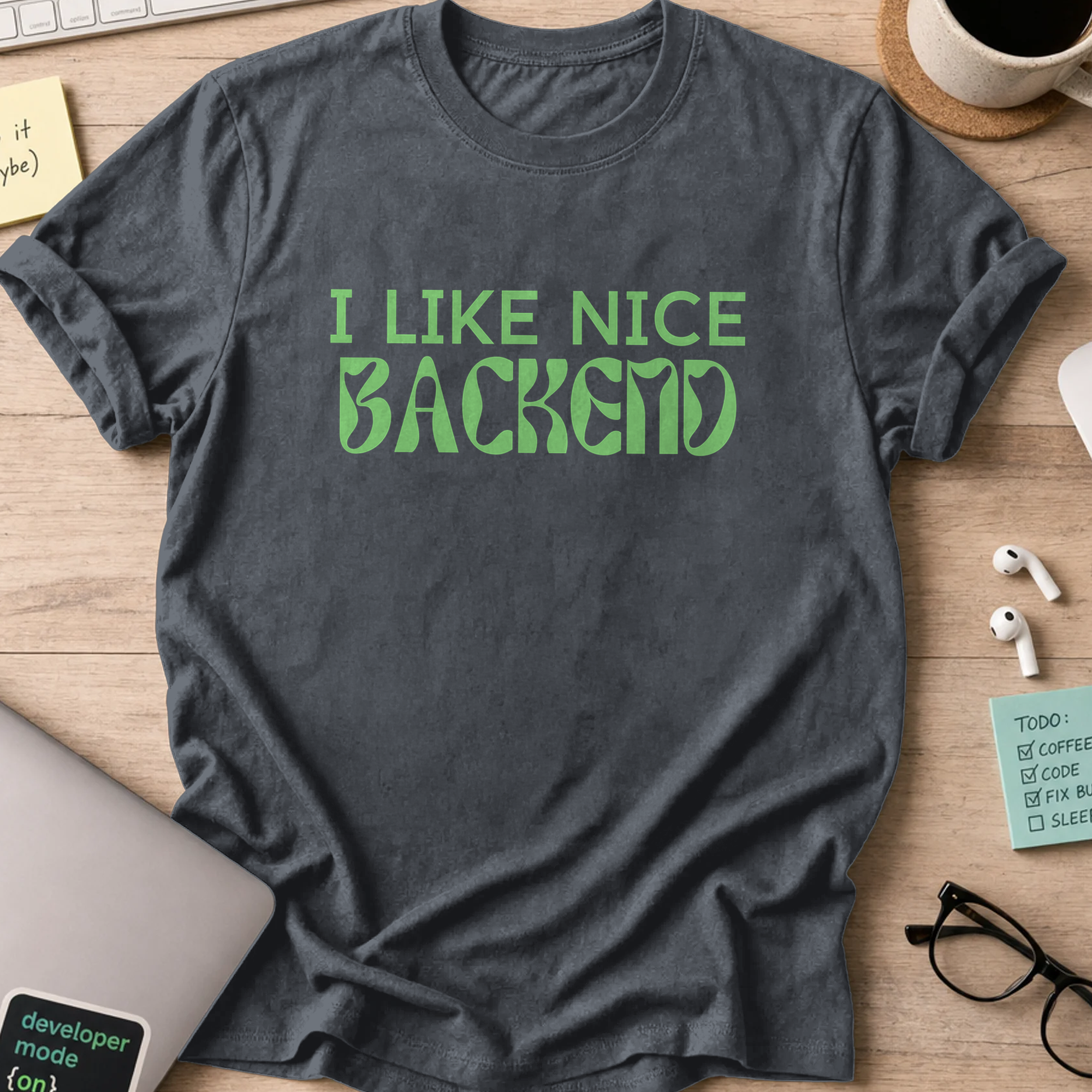 Dark Heather Grey developer shirt printed with "i like backend", a funny coding t-shirt and coding gift for backend developers.
