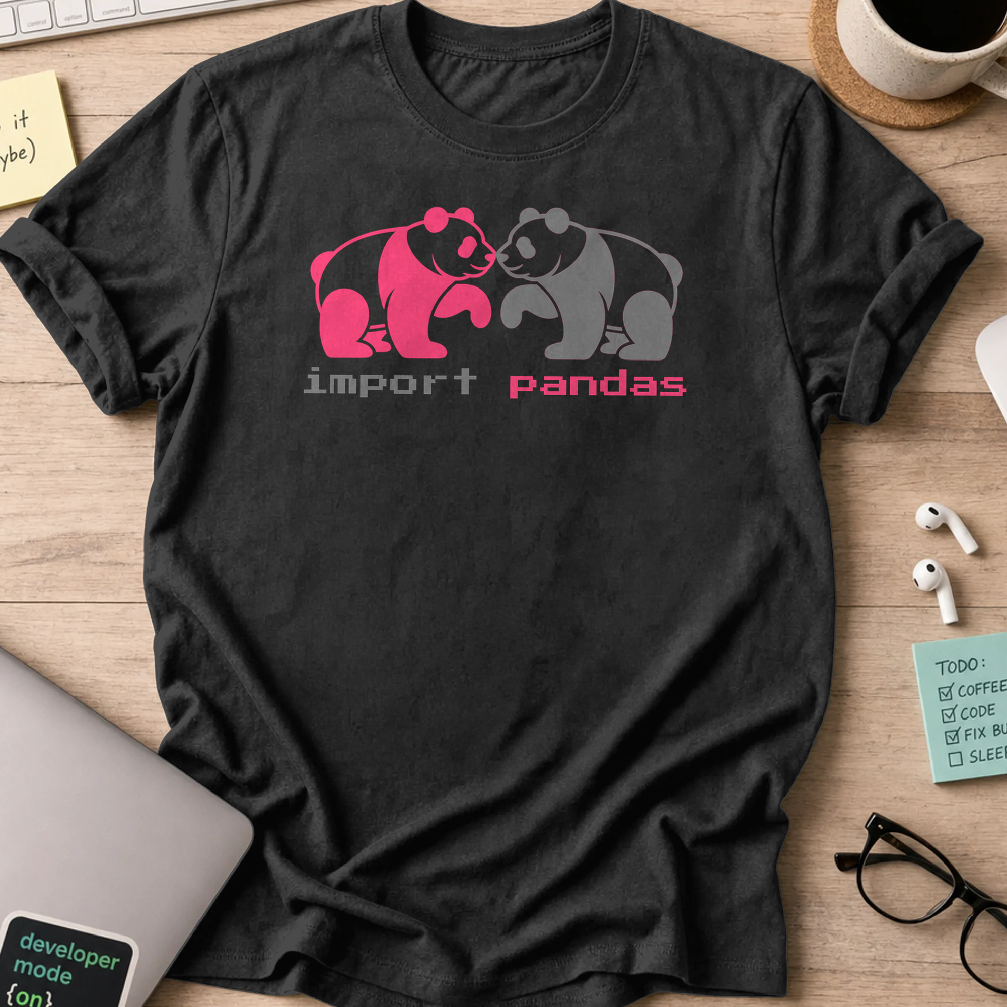 Black programmer shirt printed with "import panda", a funny developer t-shirt and coding gift for software engineers and coders.