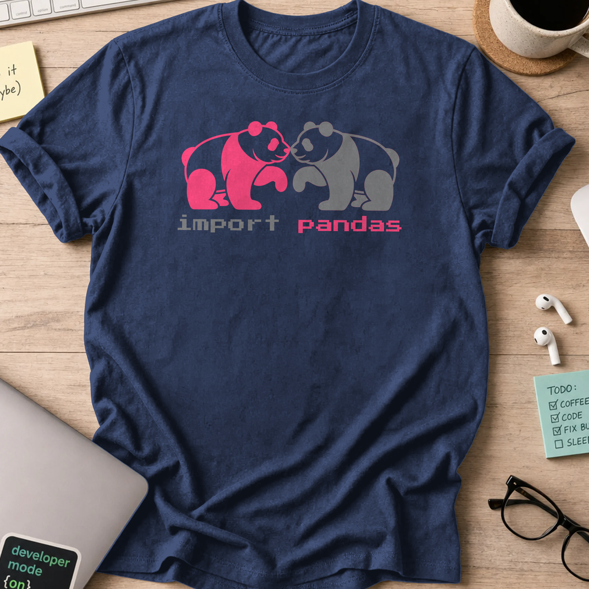 Navy programmer shirt printed with "import panda", a funny developer t-shirt and coding gift for software engineers and coders.