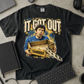 It Got Out Shirt — Black Comfort Colors 1717 flat lay