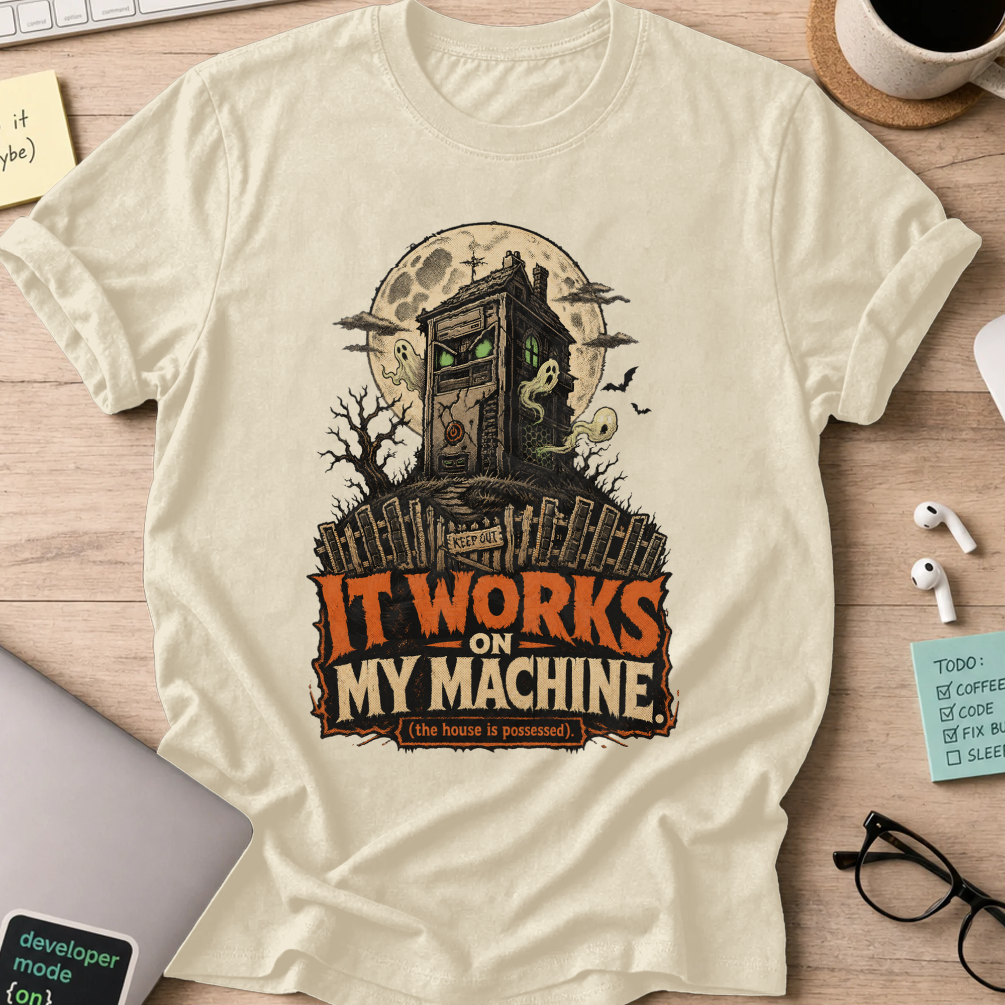 It Works on My Machine: The House Is Possessed Shirt — Natural storefront mockup