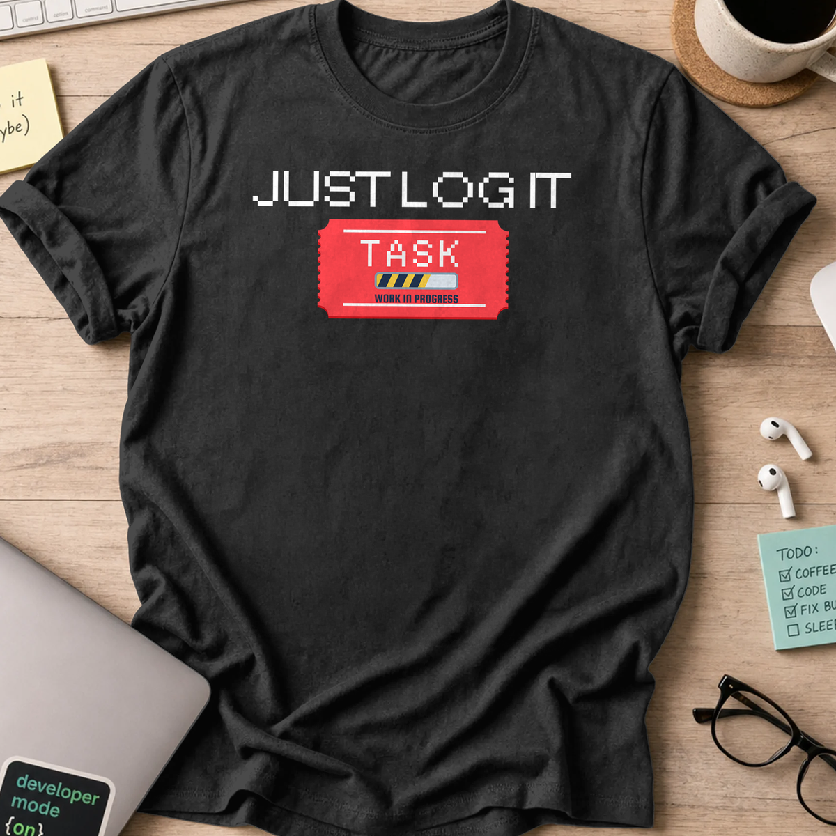Black programmer shirt printed with "just log it", a funny developer t-shirt and coding gift for software engineers and coders.