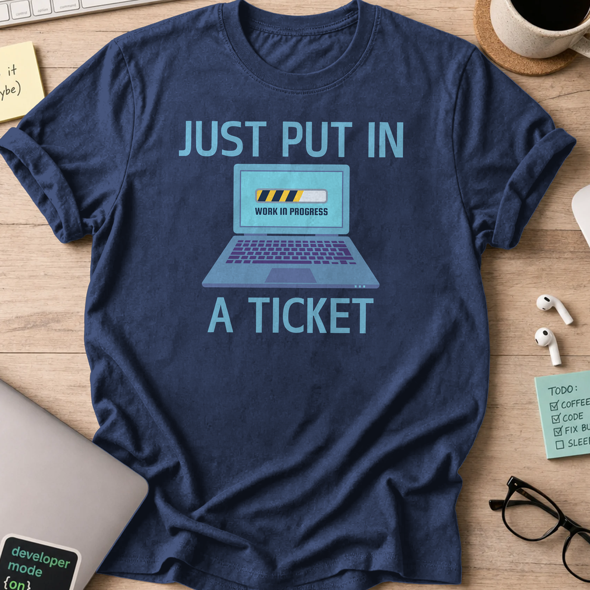 Navy devops shirt printed with "just put in a ticket", a funny programmer t-shirt and coding gift for software engineers and DevOps teams.